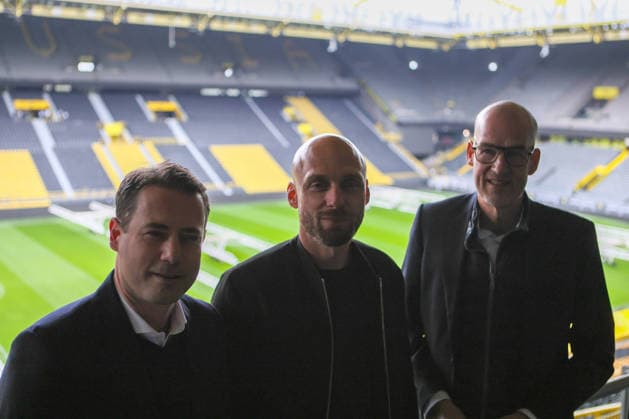 Dortmund, Germany March 25, 2026 Press conference Presentation of the new BVB Sports Director Ole Book In the picture from left Managing Director Sport Lars Ricken BVB , the new BVB Sports Director Ole Book BVB and Managing Director Carsten Cramer BVB in front of the stadium backdrop DFB regulations prohibit any use of photographs as image sequences and or quasi photo Copyright: HMBxMedia MadeleinexFantini