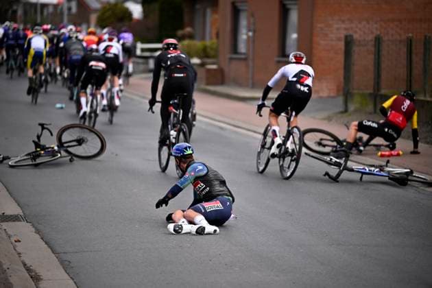 Tour of Bruges 2026 Cycling Race BRUGGE, BELGIUM - MARCH 25 : crash of a rider of team Soudal - Quick Step during the 50th edition of Tour of Bruges an UCI World Tour 1.UWT one day cycling road race for Men Elite of 202.9 km with start in Brugge and finish in Brugge on March 25, 2026 in Brugge, Belgium, 25 03 2026 ( Motordriver Kenny Verfaillie - Brugge Belgium  Copyright: xTomasxSiskx