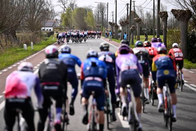 Tour of Bruges 2026 Cycling Race BRUGGE, BELGIUM - MARCH 25 : illustration picture peloton riding in echelons during the 50th edition of Tour of Bruges an UCI World Tour 1.UWT one day cycling road race for Men Elite of 202.9 km with start in Brugge and finish in Brugge on March 25, 2026 in Brugge, Belgium, 25 03 2026 ( Motordriver Kenny Verfaillie - Brugge Belgium  Copyright: xTomasxSiskx