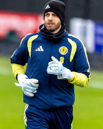 Scotland Training Angus Gunn of Scotland national team, Nationalteam walks onto the pitch during the Scotland training session ahead of their International Challenge Match, Scotland vs Japan, Lesser Hampden, Hampden Park, Glasgow, Scotland, 25 03 2026. Hampden Park Lesser Hampden Glasgow Scotland Editorial use only , Copyright: xColinxPoultneyx PSI-23967-0052