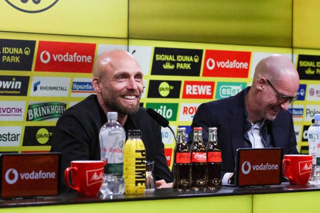 Dortmund, Germany 25 March 2026 Press conference Presentation of the new BVB Sports Director Ole Book In the picture The new BVB Sports Director Ole Book BVB and Managing Director Carsten Cramer BVB laughing at the press conference for the presentation of the new Sports Director DFB regulations prohibit any use of photographs as image sequences and or quasi photo Copyright: HMBxMedia MadeleinexFantini