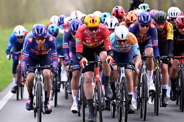 Tour of Bruges 2026 Cycling Race BRUGGE, BELGIUM - MARCH 25 : rider of team Team Picnic PostNL leading the pack during the 50th edition of Tour of Bruges an UCI World Tour 1.UWT one day cycling road race for Men Elite of 202.9 km with start in Brugge and finish in Brugge on March 25, 2026 in Brugge, Belgium, 25 03 2026 ( Motordriver Kenny Verfaillie - Brugge Belgium  Copyright: xTomasxSiskx