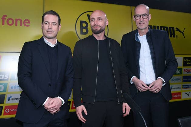 Soccer 1 Bundesliga Presentation of Nils Ole Book at Borussia Dortmund on 25 03 2026 at Signal Iduna Park in Dortmund Lars Ricken Managing Director Sport Dortmund , left Nils Ole Book Sports Director Dortmund , center Carsten Kramer Spokesman of the Management Dortmund , right xRx