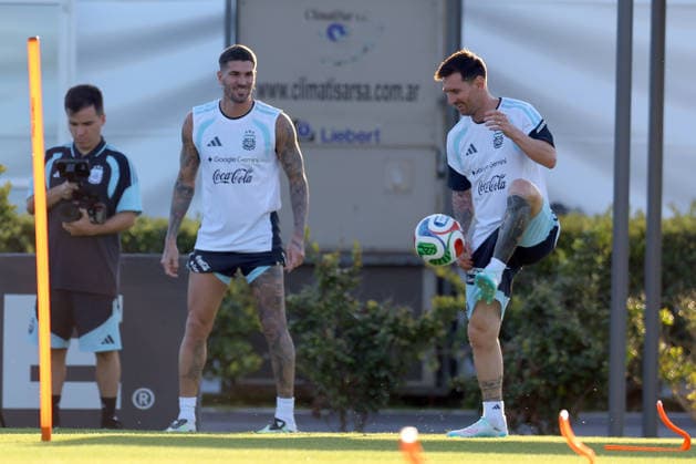 Argentina™s forward Lionel Messi R controls the ball alongside midfielder Rodrigo De Paul during a training session in Ezeiza, Buenos Aires Province, on March 25, 2026, ahead of the FIFA World Cup 2026 friendly football matches against Mauritania and Zambia EZEIZA ARGENTINA Copyright: xALEJANDROxPAGNIx