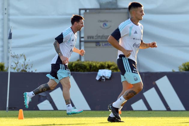 Argentina™s forward Lionel Messi L runs next his teammate defender Gabriel Rojas during a training session in Ezeiza, Buenos Aires Province, on March 25, 2026, ahead of the FIFA World Cup 2026 friendlys football matches against Mauritania and Zambia EZEIZA ARGENTINA Copyright: xALEJANDROxPAGNIx