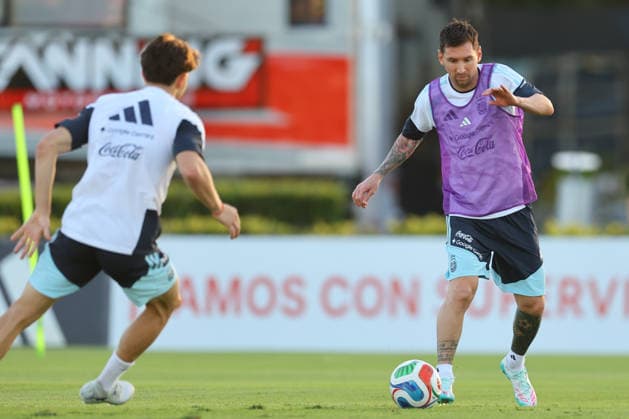 Argentina s forward Lionel Messi R controls the ball during a training session in Ezeiza, Buenos Aires Province, on March 25, 2026, ahead of the FIFA World Cup 2026 friendlys football matches against Mauritania and Zambia EZEIZA ARGENTINA Copyright: xALEJANDROxPAGNIx