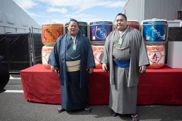 March 26, 2026, Suzuka, Mie, Japan: Sumo wrestlers visiting the paddock on media day for the 2026 Formula 1 Japanese Grand Prix. Formula 1 is one of the most logistically complicated sporting events in the world and the price of motorsport logistics has been affected by the US-Iran warÃ¢â‚¬â ¢s impact on air freight shipping lanes and oil prices. F1 2026: Japan - Media Day  - ZUMAb177 20260326_aap_b177_035 Copyright: xTaidghxBarronx