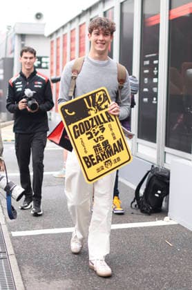 March 26, 2026, Suzuka, Mie, Japan: OLIVER BEARMAN of Haas F1 Team holds signs reading Ã¢â‚¬oeGodzilla vs BearmanÃ¢â‚¬Â in English and Japanese during media day ahead of the Formula 1 Japanese Grand Prix at Suzuka Circuit. 2026 Japanese Grand Prix  - ZUMAh201 20260326_zsp_h201_030 Copyright: xYichinxHoux