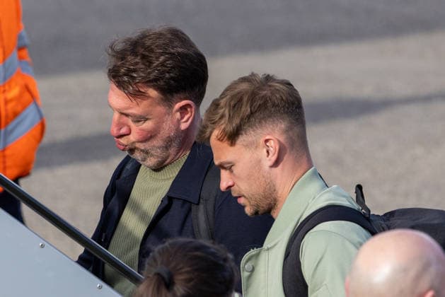 Departure of the DFB mens national soccer team for the international match in Basel, Nuremberg, 26 03 2026 Dr Philipp Laux, sports psychologist of the German mens national soccer team, and Joshua Kimmich at Nuremberg Airport boarding the Lufthansa charter plane to Basel Nuremberg Bavaria Germany 20260326-1V9A5102-M4000