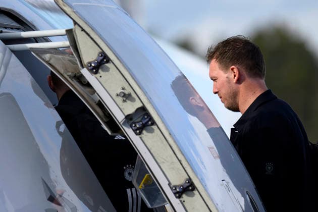 Soccer coach Julian Nagelsmann boards the plane at Nuremberg Airport before the national teams departure for the international match in Switzerland Basel The first match of the World Cup year is coming up in Switzerland Nuremberg, 26 03 2026 Bayern Germany Copyright: xDwixAnoraganingrumx