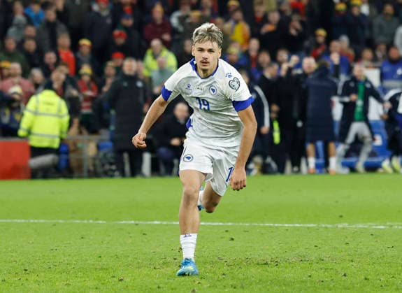 Cardiff, Wales, 26th March 2026. Kerim Alajbegovic of Bosnia and Hercegovinia turns to celebrate scoring the winning penalty during the Wales vs Bosnia-Herzegovina FIFA World Cup, WM, Weltmeisterschaft, Fussball European Qualifying play off Semi Final match at the Cardiff City Stadium, Cardiff. Picture credit should read: Cody Froggatt Sportimage EDITORIAL USE ONLY. No use with unauthorised audio, video, data, fixture lists, club league logos or live services. Online in-match use limited to 120 images, no video emulation. No use in betting, games or single club league player publications. SPI_083_CF_Wales_Bosnia SPI-4638-0089