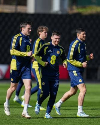 Scotland captain Andy Robertson with John Soutar (left) & Scott McKenna (right). Scotland Training Session, International Friendly, Länderspiel, Nationalmannschaft Football, Hampden Park, Glasgow, Scotland, UK - 27 Mar 2026Glasgow Hampden Park United Kingdom EDITORIAL USE ONLY No use with unauthorised audio, video, data, fixture lists, club league logos or live services. Online in-match use limited to 120 images, no video emulation. No use in betting, games or single club league player publications. Copyright: xStuartxWallace Shutterstockx 16788915aa