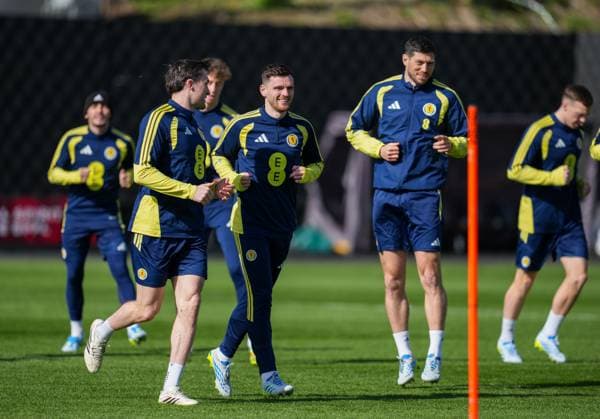 Scotland captain Andy Robertson with John Soutar (left) & Scott McKenna (right). Scotland Training Session, International Friendly, Länderspiel, Nationalmannschaft Football, Hampden Park, Glasgow, Scotland, UK - 27 Mar 2026Glasgow Hampden Park United Kingdom EDITORIAL USE ONLY No use with unauthorised audio, video, data, fixture lists, club league logos or live services. Online in-match use limited to 120 images, no video emulation. No use in betting, games or single club league player publications. Copyright: xStuartxWallace Shutterstockx 16788915ab