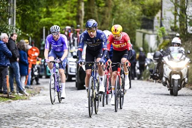 Canadian Nickolas Zukowsky of Pinarello Q36.5 Pro Cycling Team and Norwegian Sven Erik Bystrom of Uno-X Mobility pictured in action during the E3 Saxo Bank Classic one day cycling race, 208,8km from and to Harelbeke, on Friday 27 March 2026. JASPERxJACOBS  x169077026x