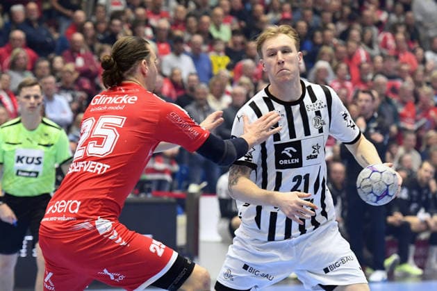 Eric Johansson THW Kiel 21 on the ball , Olle Forsell Schefvert MT Melsungen 25 , GER, MT Melsungen THW Kiel, Handball, 1 Bundesliga, Matchday 26, Season 2025 2026, 27 03 2026, GER, MT Melsungen THW Kiel, Handball, 1 Bundesliga, Matchday 26, Season 2025 2026, 27 03 2026 Kassel Copyright: xEibner-Pressefotox xRolandxSippex EP_RSL