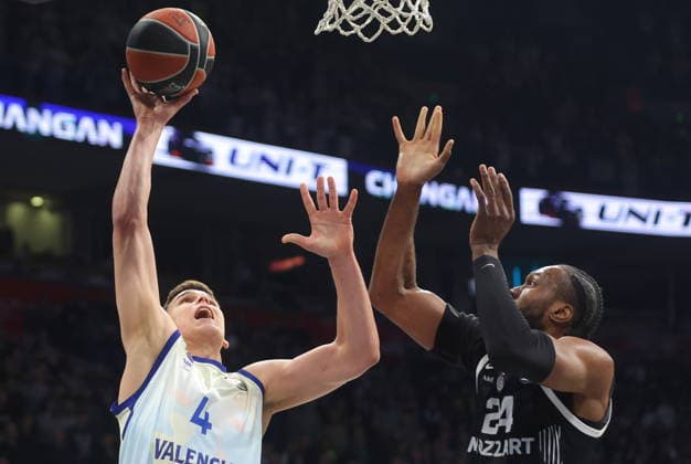 EuroLeague Basketball - Partizan Belgrade vs Valencia Basket Valencia s Jaime Pradilla (L) in action against Partizan s Bruno Fernando (R) during the Euroleague basketball match between Partizan Belgrade and Valencia Basket in Belgrade, Serbia, 27 March 2026. BELGRADE SERBIA  Copyright: xANDREJxCUKICx