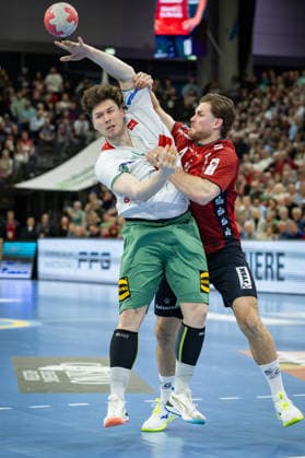 DAIKIN HBL SG Flensburg Handewitt vs GWD Minden 27 03 26 Philipp Vorlicek Nr 22, GWD Minden vs Johannes Golla Nr 04, SG Flensburg Handewitt DAIKIN HBL SG Flensburg Handewitt vs GWD Minden, GP JOULE Arena on 27 03 26 Copyright: xBEAUTIFULxSPORTS MarioxM.xKobergx