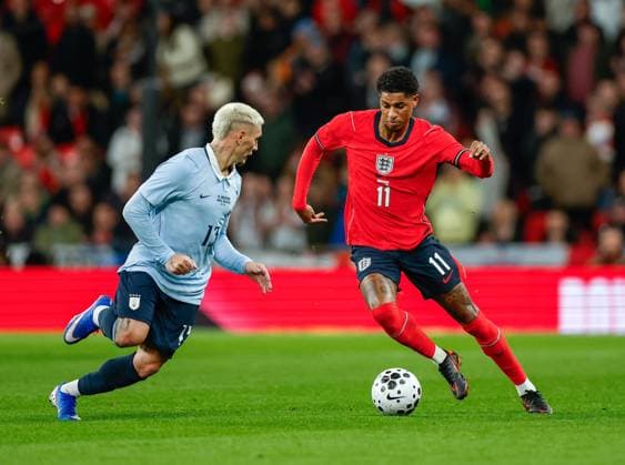Marcus Rasford of England takes on Guillermo Varela of Uruguay England v Uruguay, Football, International Friendly, Länderspiel, Nationalmannschaft Wembley Stadium, Wembley, London - UK, 27 03 2026  Copyright: xMattxImpey Shutterstockx 16805567l