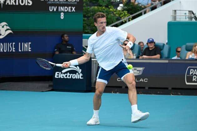 MIAMI GARDENS, FL - MARCH 27: Jiri Lehecka of Czechia returns a shot to Arthur Fils of France during the men™s semifinal match of the Miami Open on March 27, 2026. at Hard Rock Stadium in Miami Gardens, Florida. (Photo by Michele Eve Sandberg Icon Sportswire) TENNIS: MAR 27 Miami Open EDITORIAL USE ONLY Icon2603270660
