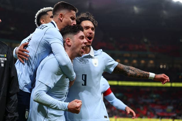 London, England, 27th March 2026. Federico Valverde of Uruguay celebrates with team mates after scoring to make it 1-1 during the England vs Uruguay International Friendly, Länderspiel, Nationalmannschaft match at Wembley Stadium, London. Picture credit should read: Paul Terry Sportimage EDITORIAL USE ONLY. No use with unauthorised audio, video, data, fixture lists, club league logos or live services. Online in-match use limited to 120 images, no video emulation. No use in betting, games or single club league player publications. SPI_039_PT_England_Uruguay SPI-4639-0039