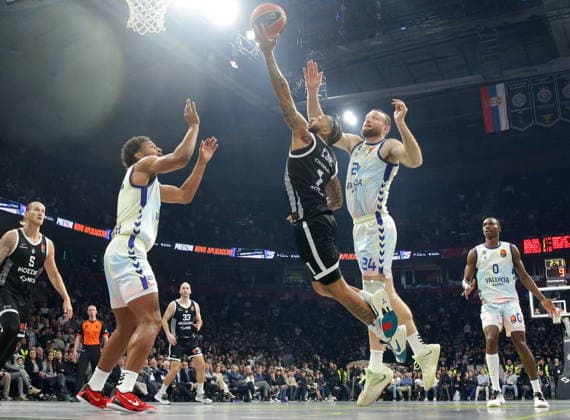 EuroLeague Basketball - Partizan Belgrade vs Valencia Basket Partizan s Carlik Jones (C) in action against Valencia s Matthew Costello (R) and Braxton Key (L) during the Euroleague basketball match between Partizan Belgrade and Valencia Basket in Belgrade, Serbia, 27 March 2026. BELGRADE SERBIA  Copyright: xANDREJxCUKICx