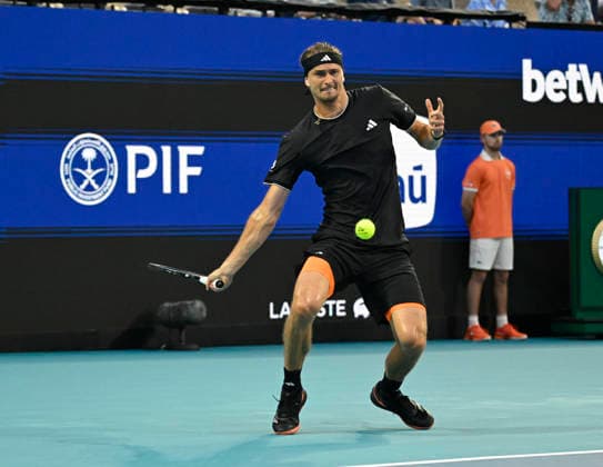 MIAMI GARDENS, FL - MARCH 27: Alexander Zverev of Germany returns a shot to Jannik Sinner of Italy during the men™s semifinal match of the Miami Open on March 27, 2026, at Hard Rock Stadium in Miami Gardens, Florida. (Photo by Michele Eve Sandberg Icon Sportswire) TENNIS: MAR 27 Miami Open EDITORIAL USE ONLY Icon2603270725