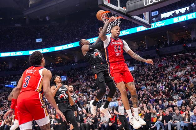 March 27, 2026, Toronto, On, CAN: Toronto Raptors RJ Barrett (9) scores on New Orleans Pelicans Jordan Hawkins (24) during first half NBA, Basketball Herren, USA basketball action in Toronto on Friday March 27 2026. Canada News - March 27, 2026  - ZUMAc35_ 20260327_zaf_c35_163 Copyright: xChrisxYoungx