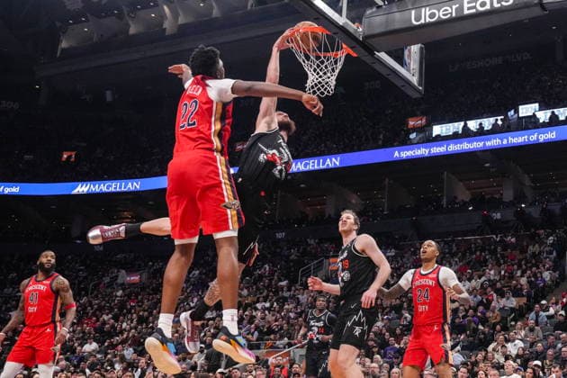 March 27, 2026, Toronto, On, CAN: Toronto Raptors Sandro Mamukelashvili (54) dunks on New Orleans Pelicans Derik Queen (22) during first half NBA, Basketball Herren, USA basketball action in Toronto on Friday March 27 2026. Sandro Mamukelashvili; Derik Queen  - ZUMAc35_ 20260327_zaf_c35_164 Copyright: xChrisxYoungx