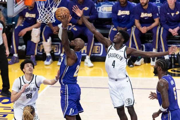 March 27, 2026, Los Angeles, California, USA: Los Angeles LakersÃ¢â‚¬â ¢ LeBron James (23) goes to the basket under pressure from Brooklyn NetsÃ¢â‚¬â ¢ Drake Powell (4) during an NBA, Basketball Herren, USA basketball game at Crypto.com Arena on Friday, March 27, 2026 in Los Angeles. NBA 2026: Nets Vs Lakers  - ZUMAc68_ 20260327_zaf_c68_007 Copyright: xRingoxChiux