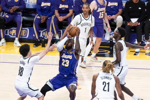 March 27, 2026, Los Angeles, California, USA: Los Angeles LakersÃ¢â‚¬â ¢ LeBron James (23) is defended by Brooklyn NetsÃ¢â‚¬â ¢ Nolan Traore (88) during an NBA, Basketball Herren, USA basketball game at Crypto.com Arena on Friday, March 27, 2026 in Los Angeles. NBA 2026: Nets Vs Lakers  - ZUMAc68_ 20260327_zaf_c68_010 Copyright: xRingoxChiux
