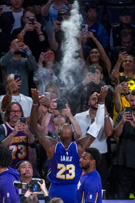 March 27, 2026, Los Angeles, California, USA: Los Angeles LakersÃ¢â‚¬â ¢ LeBron James (23) tosses powder before an NBA, Basketball Herren, USA basketball game against the Brooklyn Nets at Crypto.com Arena on Friday, March 27, 2026 in Los Angeles. NBA 2026: Nets Vs Lakers  - ZUMAc68_ 20260327_zaf_c68_013 Copyright: xRingoxChiux