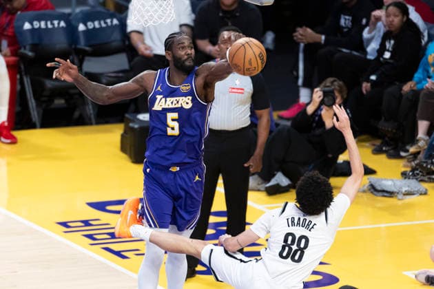 March 27, 2026, Los Angeles, California, USA: Los Angeles LakersÃ¢â‚¬â ¢ Deandre Ayton (5) blocks a shot by Brooklyn NetsÃ¢â‚¬â ¢ Nolan Traore (88) during an NBA, Basketball Herren, USA basketball game at Crypto.com Arena on Friday, March 27, 2026 in Los Angeles. NBA 2026: Nets Vs Lakers  - ZUMAc68_ 20260327_zaf_c68_025 Copyright: xRingoxChiux