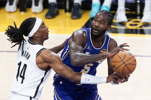 March 27, 2026, Los Angeles, California, USA: Los Angeles LakersÃ¢â‚¬â ¢ Deandre Ayton (5) is defended by Brooklyn NetsÃ¢â‚¬â ¢ Terance Mann (14) during an NBA, Basketball Herren, USA basketball game at Crypto.com Arena on Friday, March 27, 2026 in Los Angeles. NBA 2026: Nets Vs Lakers  - ZUMAc68_ 20260327_zaf_c68_027 Copyright: xRingoxChiux