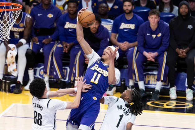 March 27, 2026, Los Angeles, California, USA: Los Angeles LakersÃ¢â‚¬â ¢ Jaxson Hayes (11) grabs a rebound against Brooklyn NetsÃ¢â‚¬â ¢ Nolan Traore (88) and Ziaire Williams (1) during an NBA, Basketball Herren, USA basketball game at Crypto.com Arena on Friday, March 27, 2026 in Los Angeles. NBA 2026: Nets Vs Lakers  - ZUMAc68_ 20260327_zaf_c68_036 Copyright: xRingoxChiux