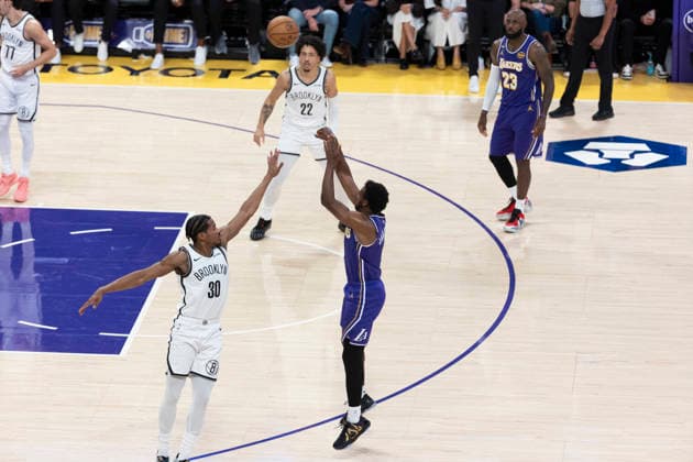 March 27, 2026, Los Angeles, California, USA: Los Angeles LakersÃ¢â‚¬â ¢ LeBron James (23) looks on as Bronny James (9) shoots against Brooklyn NetsÃ¢â‚¬â ¢ Ochai Agbaji (30) during an NBA, Basketball Herren, USA basketball game at Crypto.com Arena on Friday, March 27, 2026 in Los Angeles. NBA 2026: Nets Vs Lakers  - ZUMAc68_ 20260327_zaf_c68_037 Copyright: xRingoxChiux