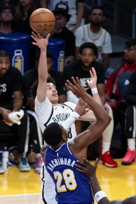 March 27, 2026, Los Angeles, California, USA: Brooklyn NetsÃ¢â‚¬â ¢ Nolan Traore (88) shoots against Los Angeles LakersÃ¢â‚¬â ¢ Rui Hachimura (28) during an NBA, Basketball Herren, USA basketball game at Crypto.com Arena on Friday, March 27, 2026 in Los Angeles. NBA 2026: Nets Vs Lakers  - ZUMAc68_ 20260327_zaf_c68_039 Copyright: xRingoxChiux