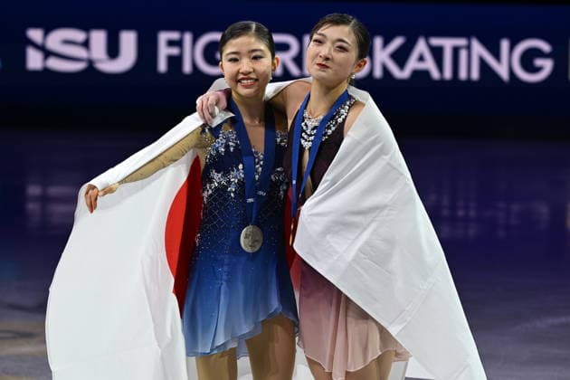ISU Figure skating, Eiskunstlauf World Championships 2026 at the O2 Arena in Prague, Czech Republic - 27 Mar 2026 Gold medalist Kaori Sakamoto (R) and Silver medailist Mone Chiba both of Japan as seen during the medal ceremony for the Women competition at the ISU Figure Skating World Championships 2026 at the O2 Arena. ISU Figure Skating World Championships 2026 takes place from 24th to 29th of March in Prague, Czech Republic. Prague Czech Republic Copyright: xTomasxTkacikx xSOPAxImagesx 20260327-ISU-women-46