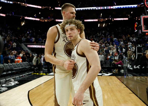 NBA, Basketball Herren, USA - Washington Wizards at Golden State Warriors Golden State Warriors forward center Kristaps PorziÅÜÄ£is (L) and Golden State Warriors guard Brandin Podziemski (R) celebrate after the NBA basketball game between the Washington Wizards and the Golden State Warriors in San Francisco, California, USA, 27 March 2026. SAN FRANCISCO CALIFORNIA United States  Copyright: xJOHNxG.xMABANGLOx