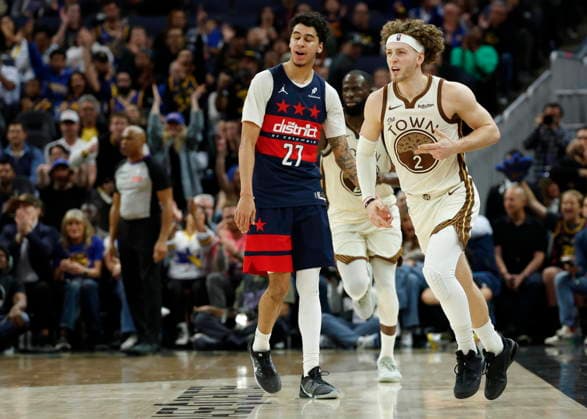 NBA, Basketball Herren, USA - Washington Wizards at Golden State Warriors Golden State Warriors guard Brandin Podziemski (R) reacts after shooting a three point basket as Washington Wizards forward Will Riley (L) looks on during the second half of the NBA basketball game between the Washington Wizards and the Golden State Warriors in San Francisco, California, USA, 27 March 2026. SAN FRANCISCO CALIFORNIA United States  Copyright: xJOHNxG.xMABANGLOx