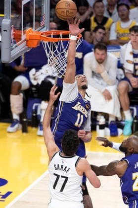March 27, 2026, Los Angeles, California, USA: Los Angeles LakersÃ¢â‚¬â ¢ Jaxson Hayes (11) blocks a shot by Brooklyn NetsÃ¢â‚¬â ¢ Ben Saraf (77) during an NBA, Basketball Herren, USA basketball game at Crypto.com Arena on Friday, March 27, 2026 in Los Angeles. NBA 2026: Lakers 116:99 Nets  - ZUMAc68_ 20260327_zaf_c68_051 Copyright: xRingoxChiux