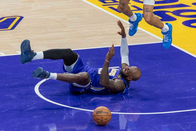 March 27, 2026, Los Angeles, California, USA: Los Angeles LakersÃ¢â‚¬â ¢ LeBron James (23) falls after colliding with Brooklyn NetsÃ¢â‚¬â ¢ Josh Minott (00) during an NBA, Basketball Herren, USA basketball game at Crypto.com Arena on Friday, March 27, 2026 in Los Angeles. NBA 2026: Lakers 116:99 Nets  - ZUMAc68_ 20260327_zaf_c68_066 Copyright: xRingoxChiux