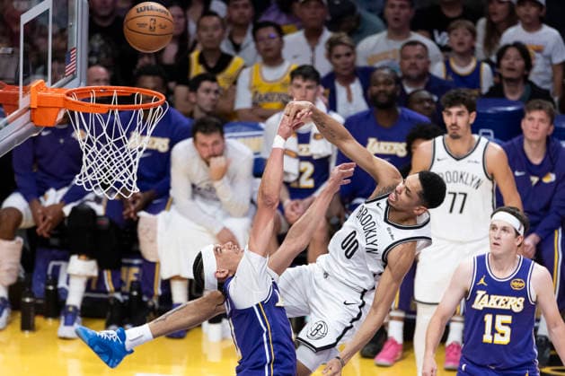 March 27, 2026, Los Angeles, California, USA: Brooklyn NetsÃ¢â‚¬â ¢ Josh Minott (00) goes to the basket against Los Angeles LakersÃ¢â‚¬â ¢ Jaxson Hayes (11) during an NBA, Basketball Herren, USA basketball game at Crypto.com Arena on Friday, March 27, 2026 in Los Angeles. NBA 2026: Lakers 116:99 Nets  - ZUMAc68_ 20260327_zaf_c68_068 Copyright: xRingoxChiux
