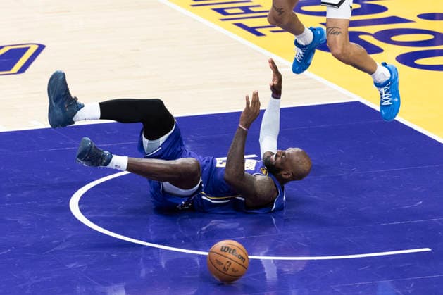 March 27, 2026, Los Angeles, California, USA: Los Angeles LakersÃ¢â‚¬â ¢ LeBron James (23) falls after colliding with Brooklyn NetsÃ¢â‚¬â ¢ Josh Minott (00) during an NBA, Basketball Herren, USA basketball game at Crypto.com Arena on Friday, March 27, 2026 in Los Angeles. NBA 2026: Lakers 116:99 Nets  - ZUMAc68_ 20260327_zaf_c68_069 Copyright: xRingoxChiux