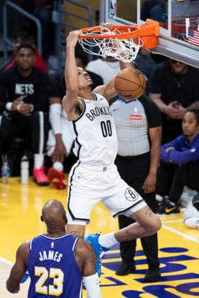 March 27, 2026, Los Angeles, California, United States: Brooklyn Nets™ Josh Minott (00) dunks against Los Angeles Lakers™ LeBron James (23) during an NBA, Basketball Herren, USA basketball game at Crypto.com Arena on Friday, March 27, 2026 in Los Angeles. NBA 2026: Lakers 116:99 Nets - 27 Mar 2026  - ZUMAs197 20260327_aaa_s197_566 Copyright: xRingoxChiux
