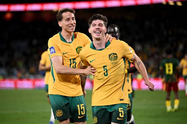SOCCER AUSTRALIA CAMEROON, Jordan Bos of Australia (right) celebrates with Kai Trewin after scoring a goal during the FIFA Series 2026 match between Australia and Cameroon at Accor Stadium in Sydney, Friday, March 27, 2026. ( NO ARCHIVING, EDITORIAL USE ONLY SYDNEY NEW SOUTH WALES AUSTRALIA  Copyright: xDANxHIMBRECHTSx 20260327172597051299