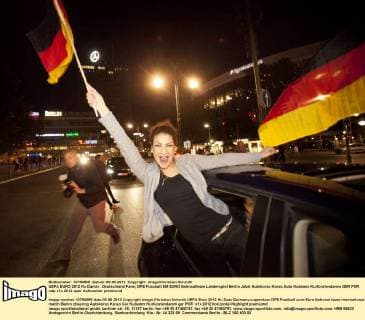 Football, EURO 2012, German fans celebrate victory against Portugal with a motorcade on Berlin's Kudamm