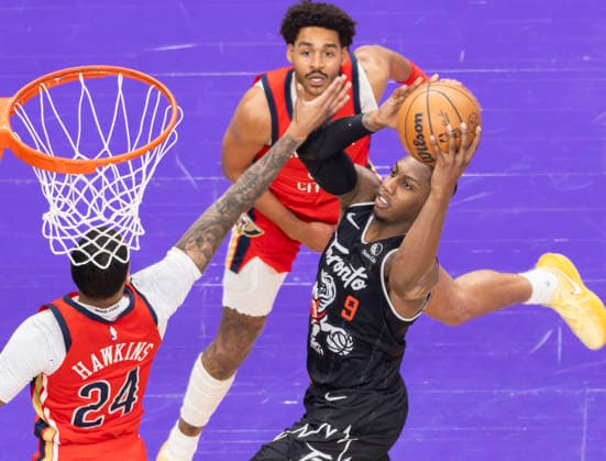 (260328) -- TORONTO, March 28, 2026 -- RJ Barrett (R) of Toronto Raptors goes for a layup during the 2025-2026 NBA, Basketball Herren, USA regular season game between Toronto Raptors and New Orleans Pelicans in Toronto, Canada, on March 27, 2026. (Photo by Xinhua) (SP) CANADA-TORONTO-BASKETBALL-NBA-PELICANS VS RAPTORS ZouxZheng 