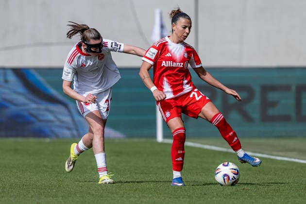 Fight for the ball duel between Julia Pollak 1 FC Nuernberg, 22 and Arianna Caruso FC Bayern Muenchen Frauen, 27 GER, FC Bayern Muenchen Frauen vs 1 FC Nuernberg, Soccer, Google Pixel Women Bundesliga, 22 Matchday, Season 2025 2026, 28 03 2026 DFL DFB REGULATIONS PROHIBIT ANY USE OF PHOTOGRAPHS as IMAGE SEQUENCES and or QUASI VIDEO GER, FC Bayern Muenchen Frauen vs 1 FC Nuernberg, Football, Google Pixel Frauen Bundesliga, 22 Spieltag, Saison 2025 2026, 28 03 2026 Muenchen Copyright: xEibner-Pressefoto HeikexFeinerx EP_HFR