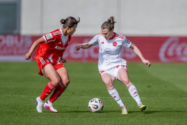 Fight for the ball duel between Momoko Tanikawa FC Bayern Muenchen Frauen, 18 and Nastassja Lein 1 FC Nuernberg, 24 GER, FC Bayern Muenchen Frauen vs 1 FC Nuernberg, Football, Google Pixel Women Bundesliga, 22 Matchday, Season 2025 2026, 28 03 2026 DFL DFB REGULATIONS PROHIBIT ANY USE OF PHOTOGRAPHS as IMAGE SEQUENCES and or QUASI VIDEO GER, FC Bayern Muenchen Frauen vs 1 FC Nuernberg, Football, Google Pixel Frauen Bundesliga, 22 Spieltag, Saison 2025 2026, 28 03 2026 Muenchen Copyright: xEibner-Pressefoto HeikexFeinerx EP_HFR
