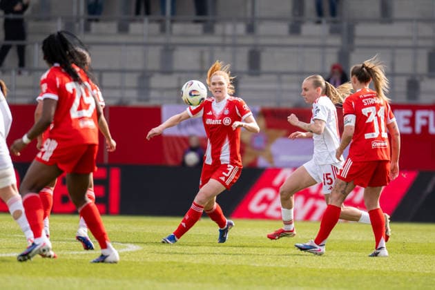 Stine Ballisager Pedersen 3 FC Bayern Muenchen in duel with Emoeke Papai 15 1 FC Nuernberg , FC Bayern Frauen Muenchen 1 FC Nuernberg, Google Pixel Frauenbundesliga, 22 Spieltag, 28 03 26 DFB regulations prohibit any use of photographs as image sequences and or quasi video kolbert press Muenchen Bayern Germany Copyright: xkolbert-press UlrichxGamelx